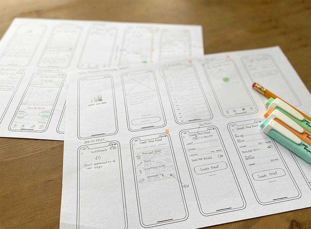 A photo of more paper wireframes with the new user flow that I created